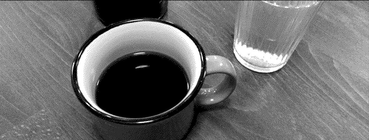 Black and white photo of a coffee.
